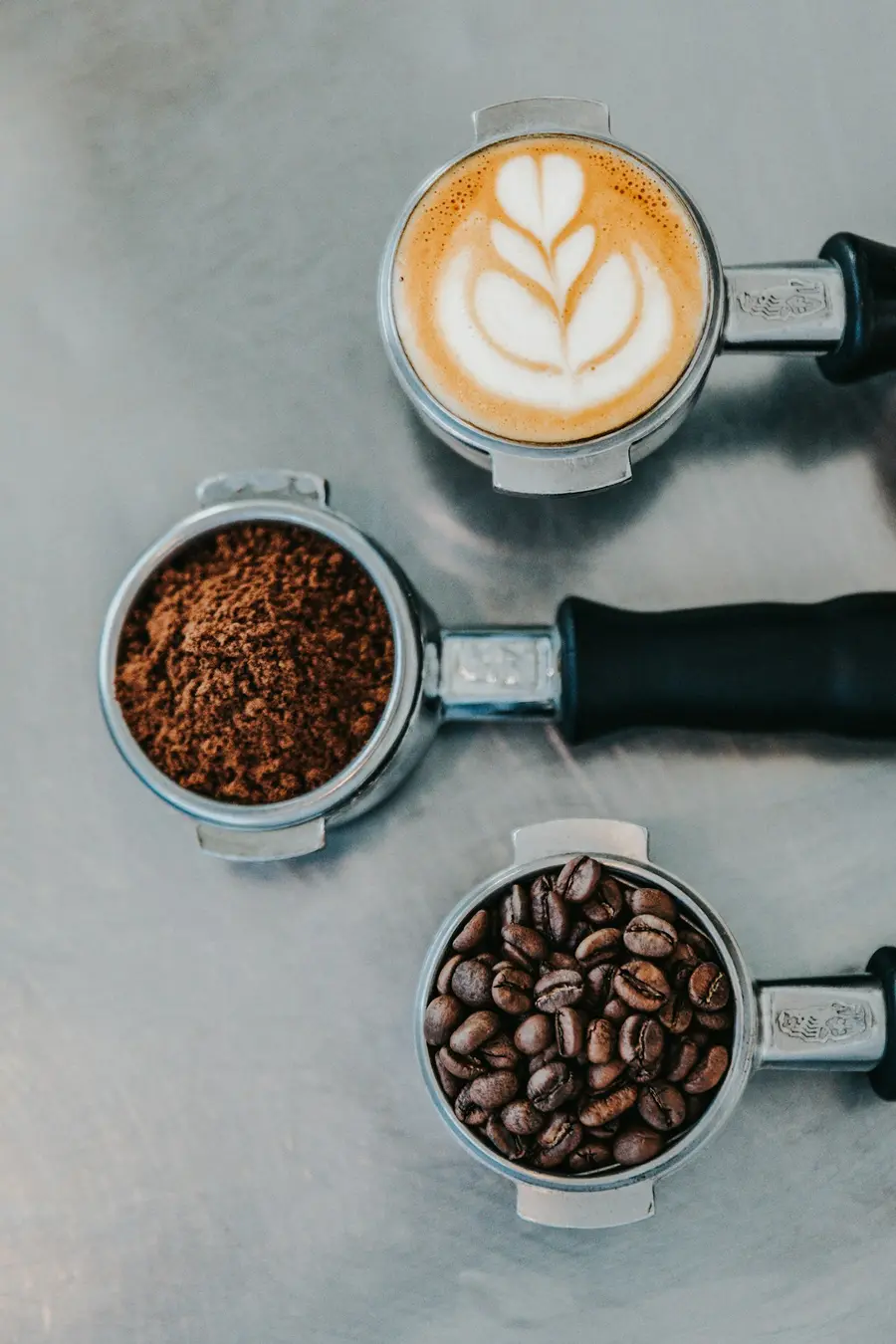 Espresso extracting from a commercial machine during barista training